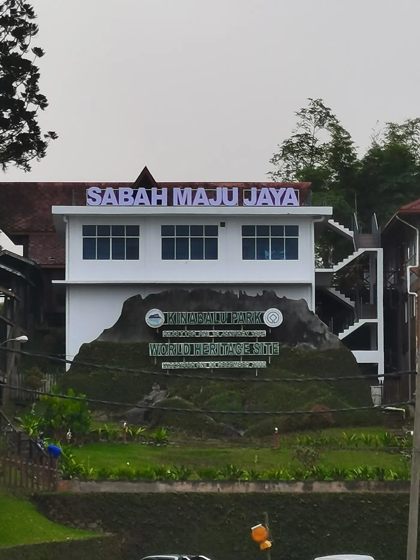 Kinabalu Park World Heritage Site sign at park headquarters