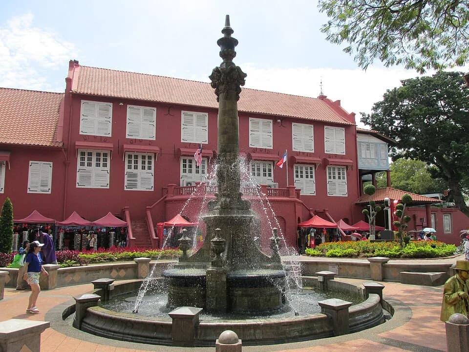 The red Stadthuys and Queen Victoria Fountain at Dutch Square in Melaka