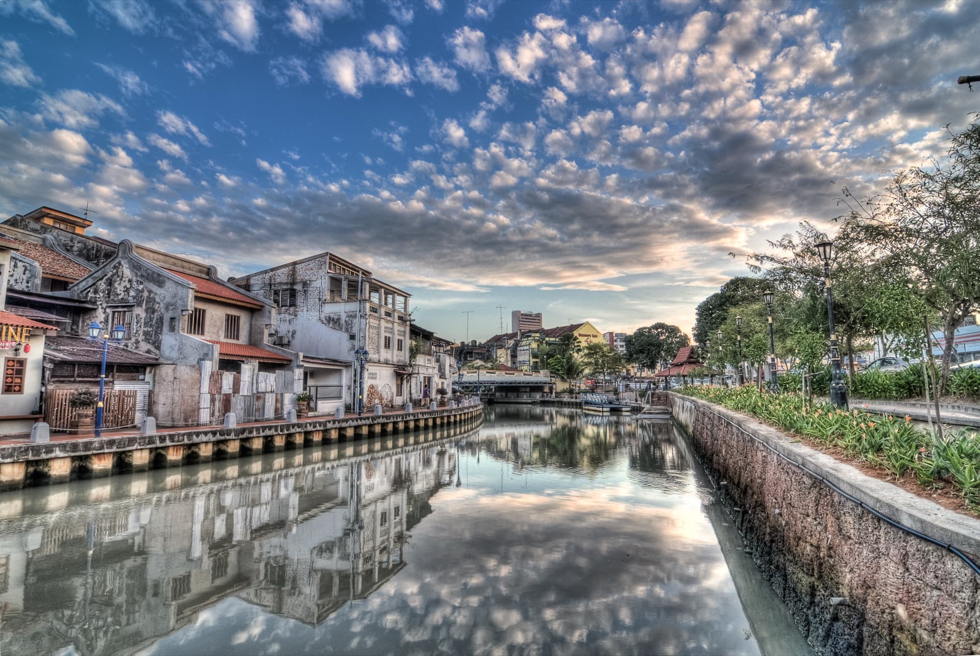 Melaka River and heritage buildings at sunrise