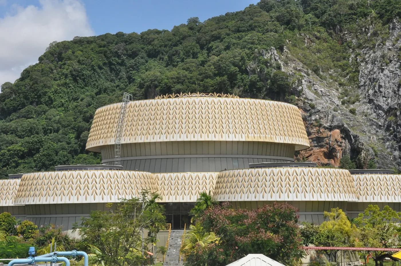 The rice-sheaf-shaped Muzium Padi building below Gunung Keriang