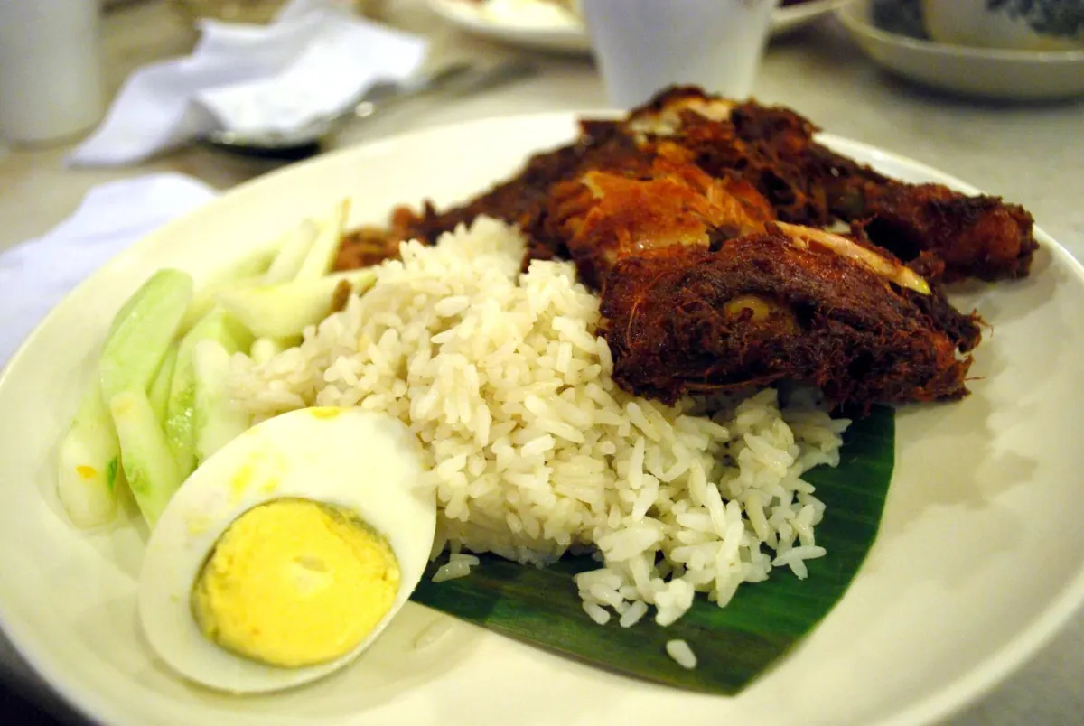 Village Park nasi lemak with fried chicken, coconut rice, cucumber and egg